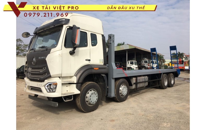 Xe tải Howo VX350 nâng đầu chở máy công trình giá bao nhiêu?