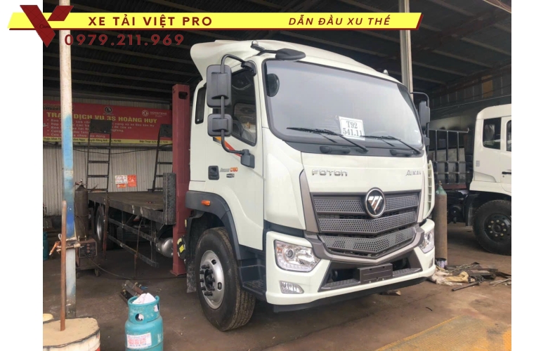 Xe tải Auman C160 nâng đầu chở máy công trình giá bao nhiêu?