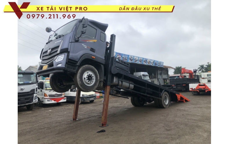 Xe tải Auman C160 nâng đầu chở máy công trình giá bao nhiêu?