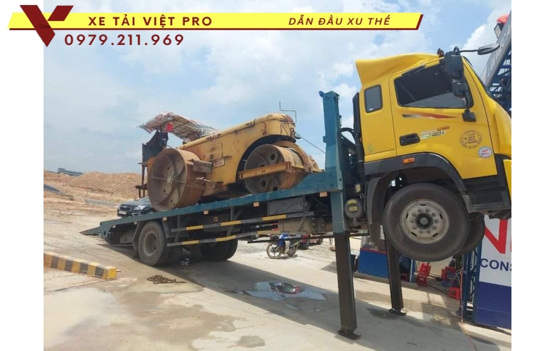 Xe tải Auman C160 nâng đầu chở máy công trình giá bao nhiêu?