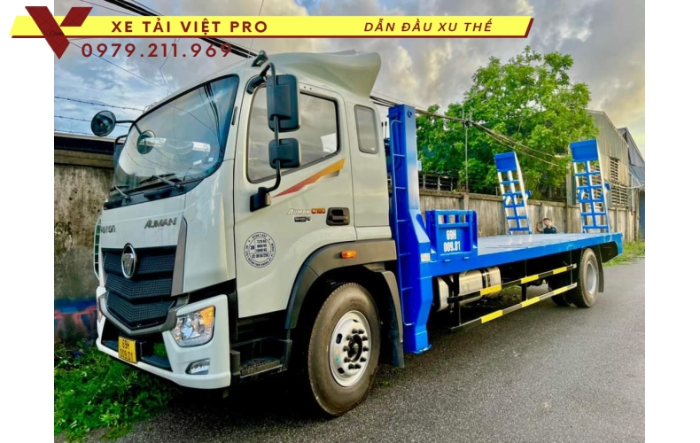 Xe tải Auman C160 nâng đầu chở máy công trình giá bao nhiêu?