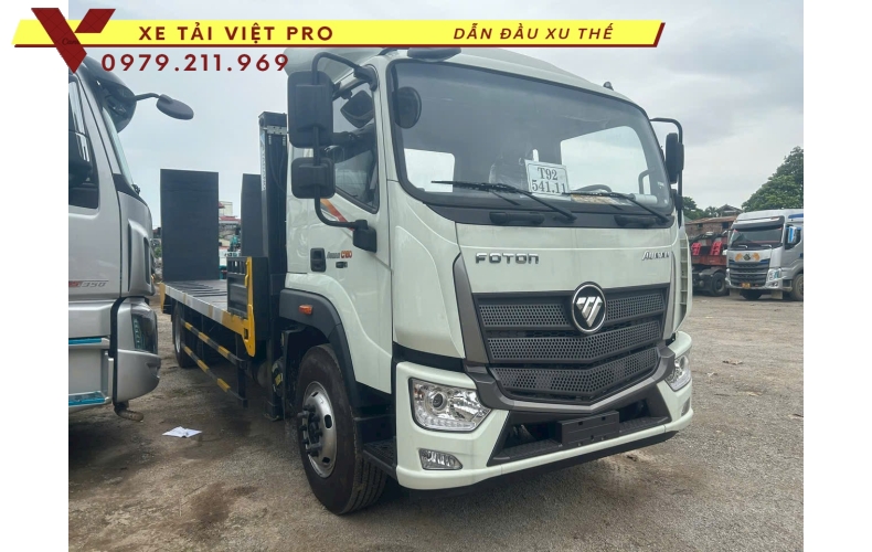 Xe tải Auman C160 nâng đầu chở máy công trình giá bao nhiêu?