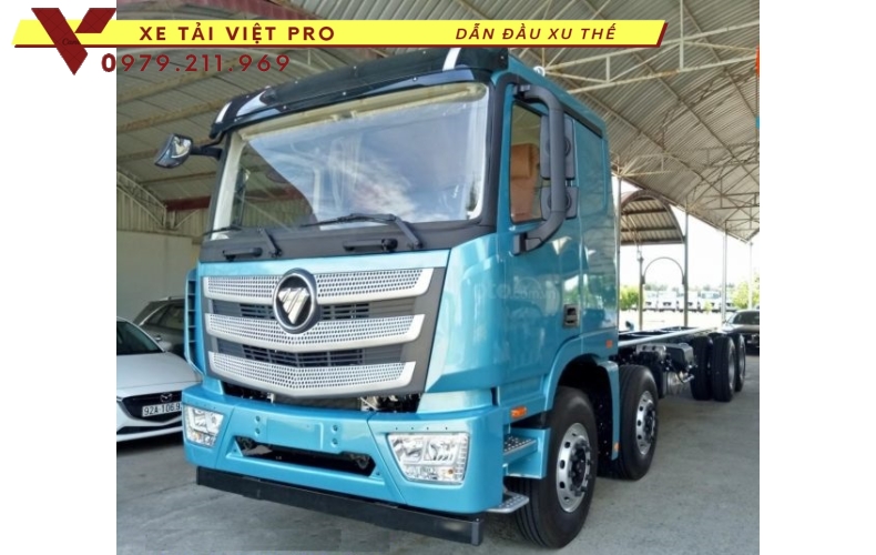 Xe Auman 4 chân nâng đầu chở máy công trình