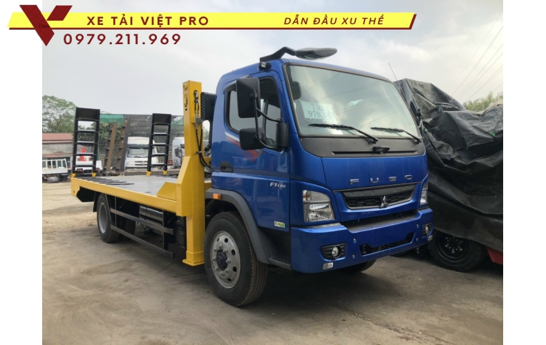 Xe tải Thaco FI170 nâng đầu chở máy công trình có giá bao nhiêu?