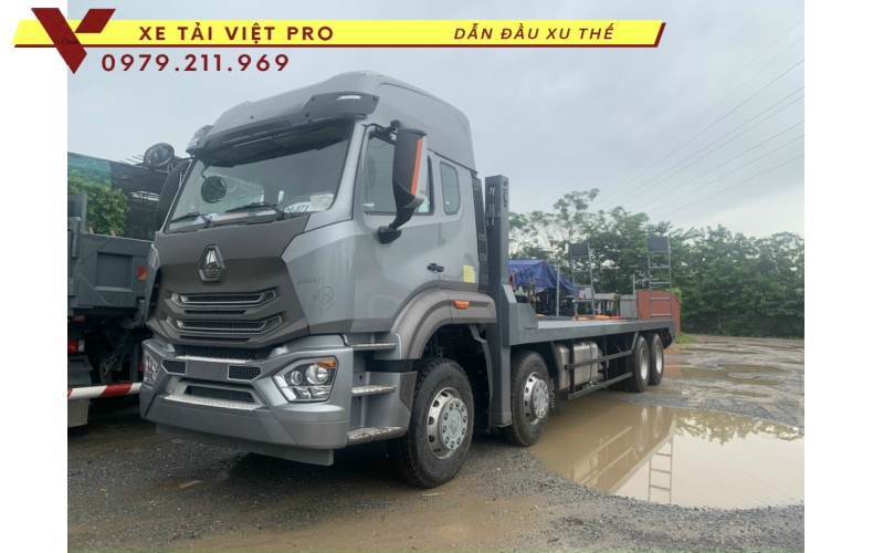 Xe tải Howo VX350 nâng đầu chở máy công trình giá bao nhiêu?